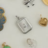 Cute, sweet, delicate, dainty, demure, elegant — these darling little charms bring classically feminine images to mind. Charms can be applied to necklaces or bracelets. 