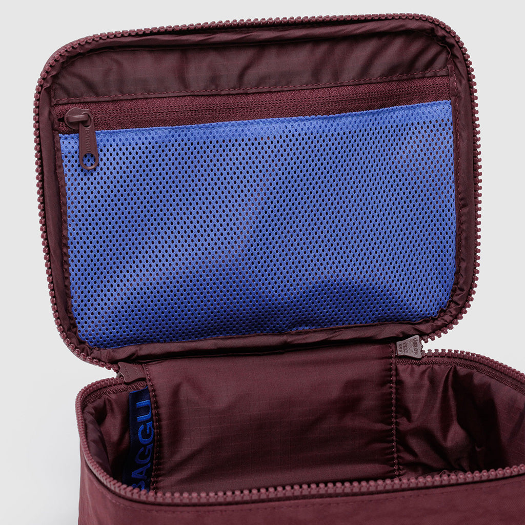 Small Cosmetic Case in Mahogany Brown and Blue by Baggu at Golden Rule Gallery