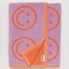 Smiley Face Lilac Baggu Bath Towel Organic Terrycloth at Golden Rule Gallery