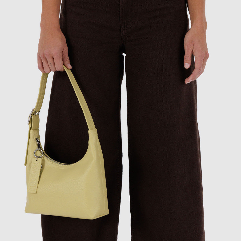 Straw Yellow Recycled Leather Mini Shoulder Bag by Baggu at Golden Rule Gallery in Excelsior MN