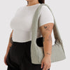 Model Wearing Baggu Striped Meringue Bag