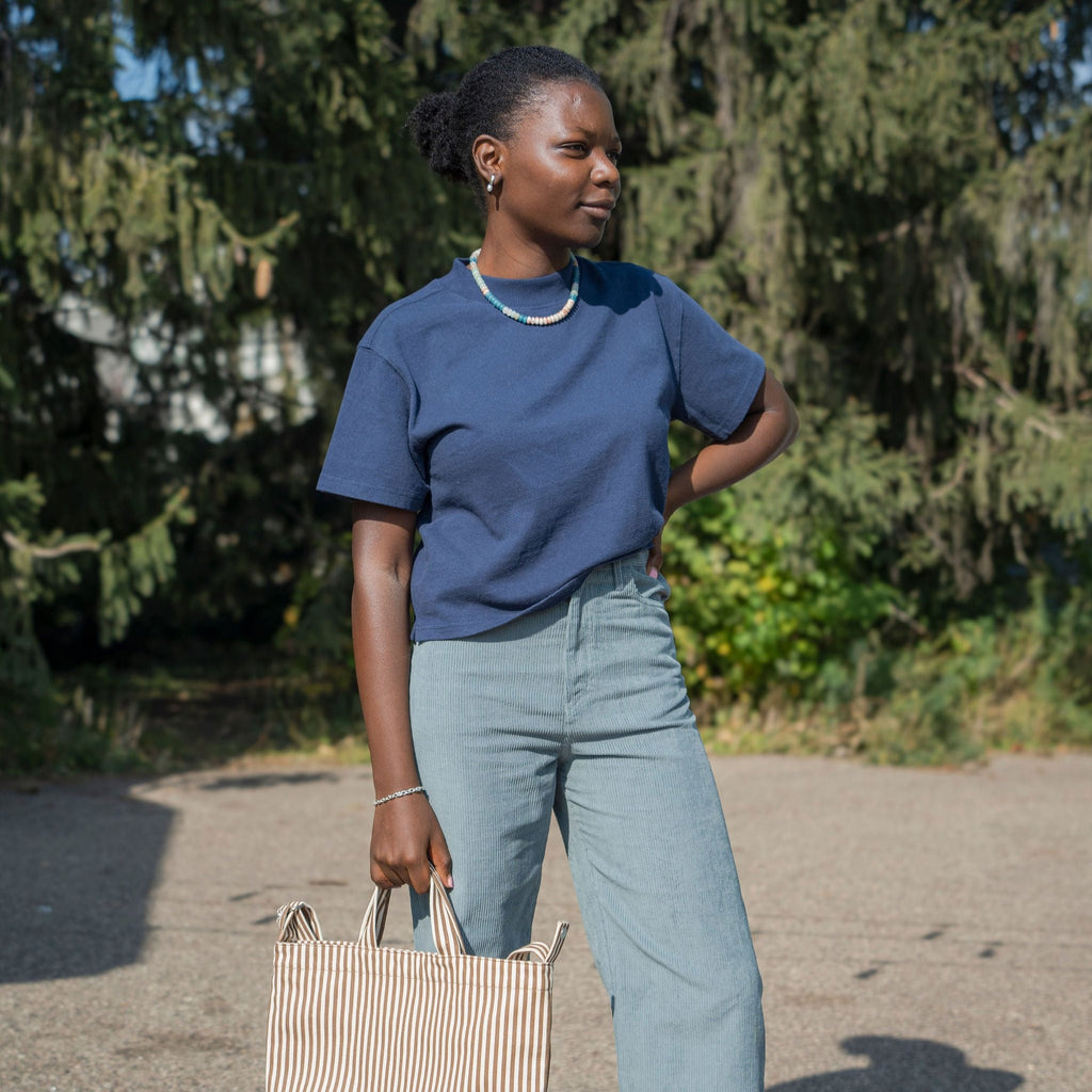 Sunset Mock Neck Tee in Midnight Blue by Le Bon Shoppe at Golden Rule Gallery