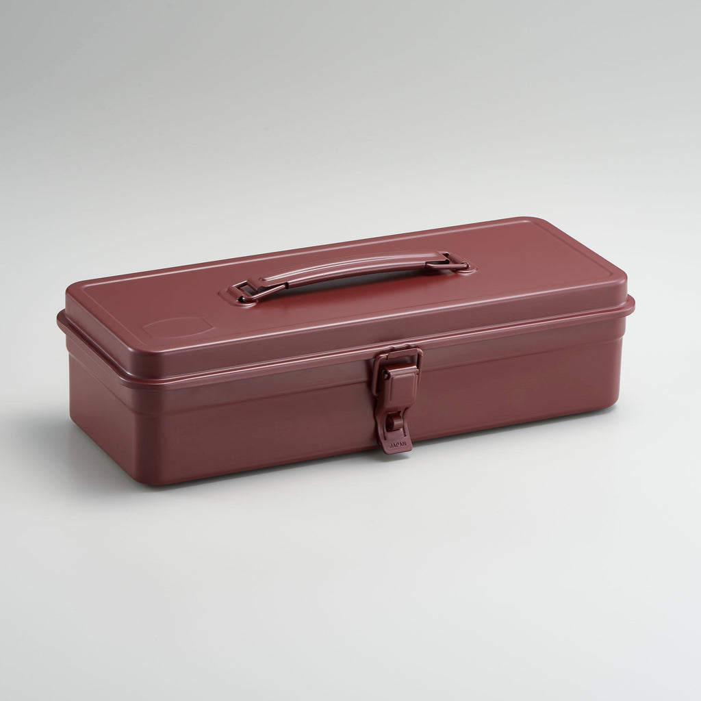 Burgundy toolbox with a handle on a light gray background