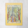 Book cover of 'Madeline' with the Eiffel Tower illustration on a yellow background