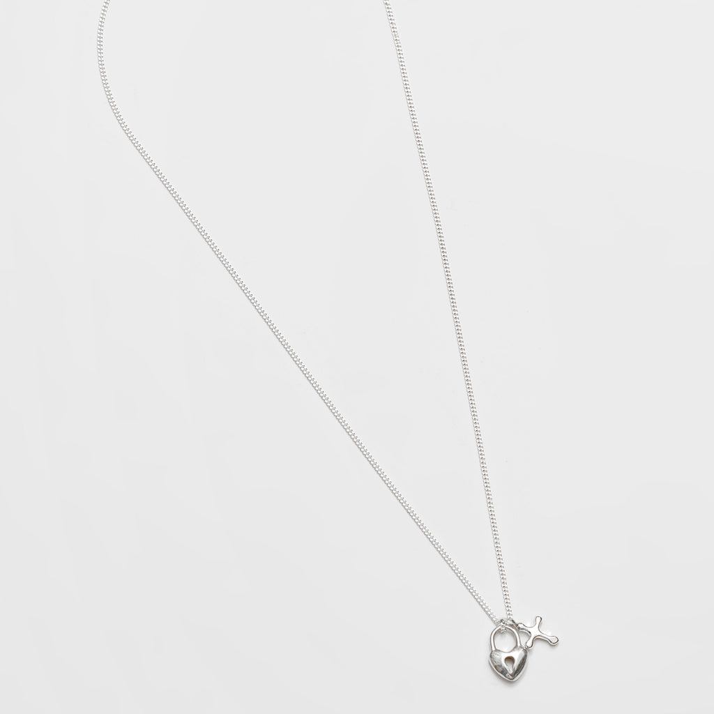 Silver Mini Cross Charm On A Necklace