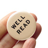 Well Read Social Alert Pinback Button at Golden Rule Gallery in Excelsior