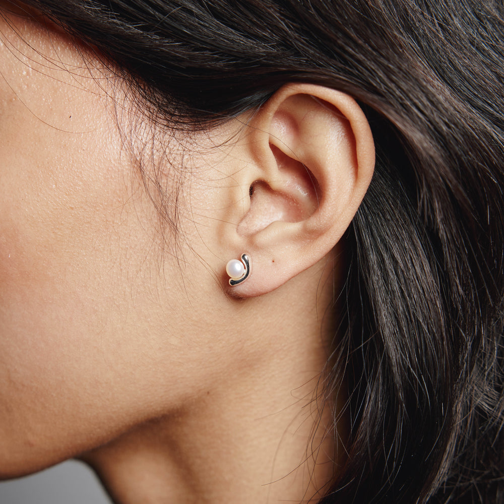 Wolf Circus Ellis Pearl Stud Earrings in Silver on Model 