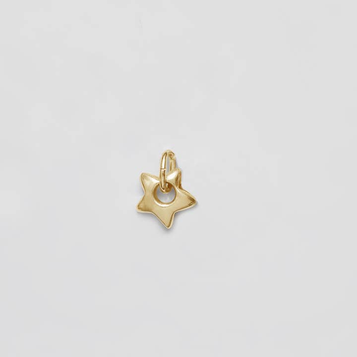 Wolf Circus Single Mini Star Charm in Gold at Golden Rule in Excelsior, Minnesota