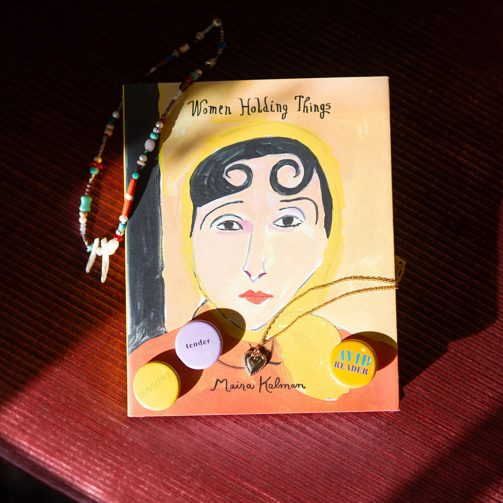 Women Holding Things Book with Pinback Buttons