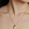Gold Pearl Orb Charm Pendant Necklace by Wolf Circus