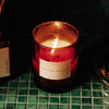 Roen Candle Burning on Counter