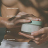 Person holding Corpus Body Butter with text highlighting vegan, cruelty-free, and chemical-free attributes.