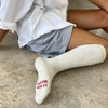 White Tall Hiker Socks by Le Bon Shoppe on Model
