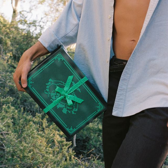 Model Holding Green Flamingo Estate Box