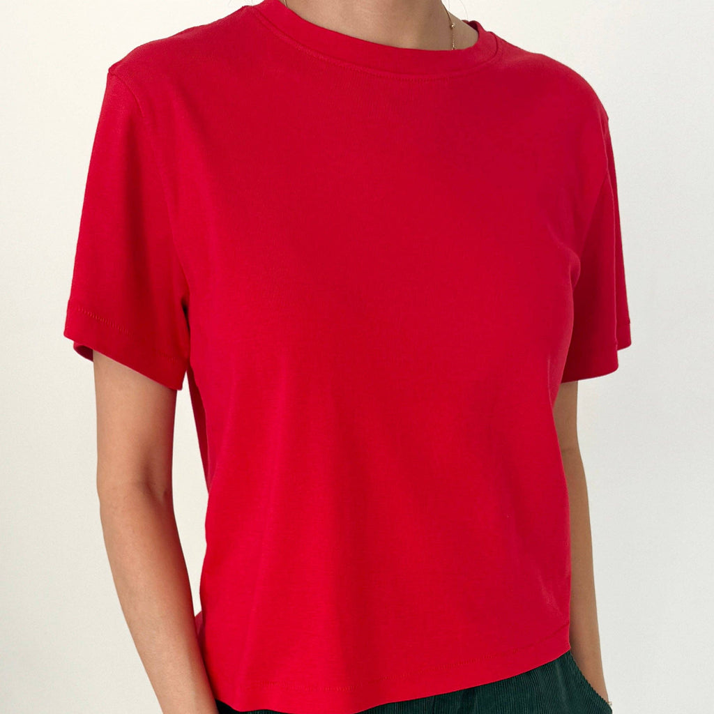 Model in classic crew neck boxy tee shirt in red