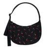 Black handbag with red rose pattern on a white background