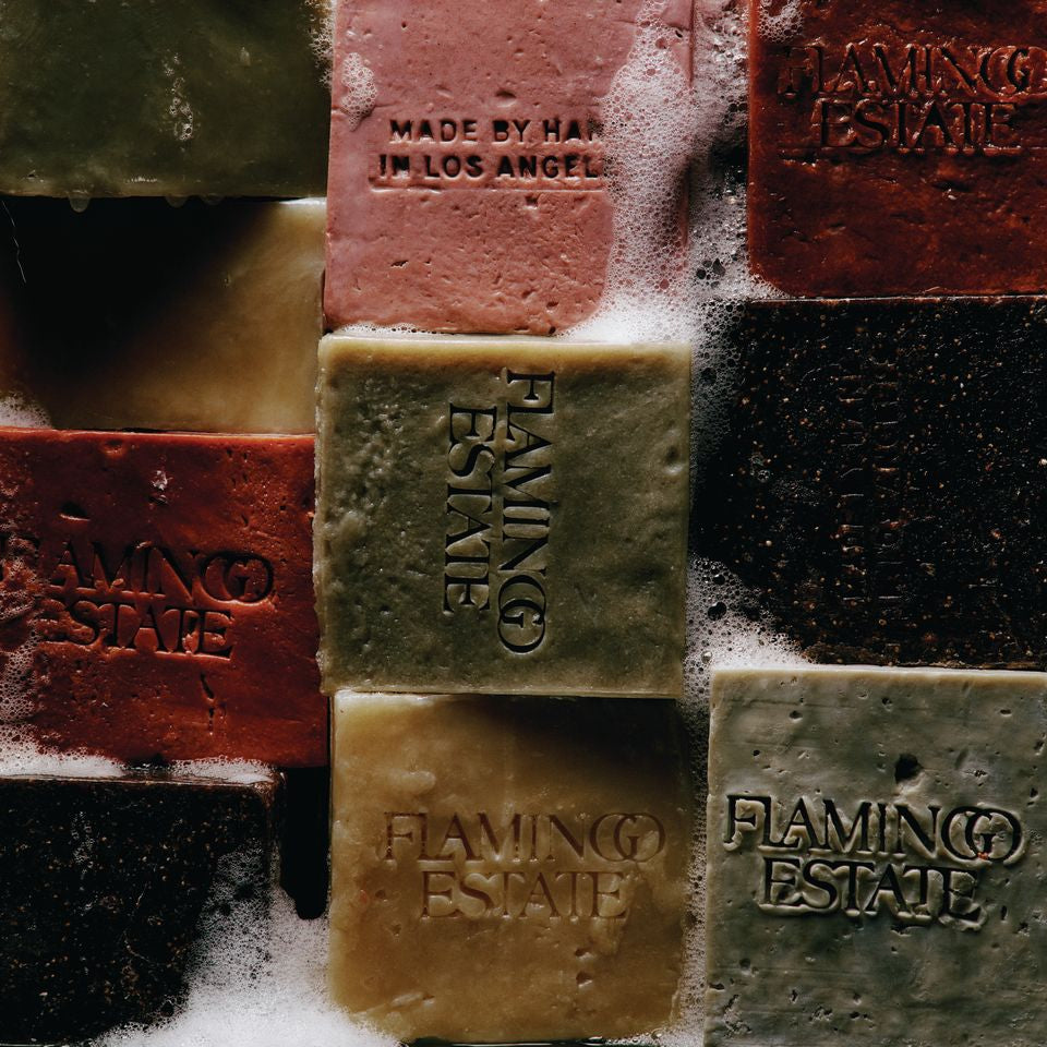 Assortment of Different Flamingo Estate Soap Bars Lathered in Soap