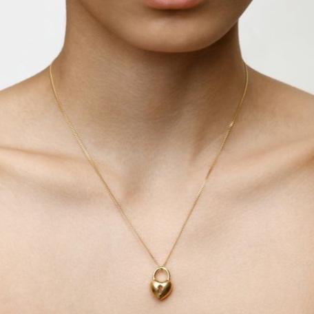 Model Wearing Gold Plated Heart Necklace by Wolf Circus Jewelry