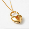 Up Close of Wolf Circus Gold Heart Locket Necklace