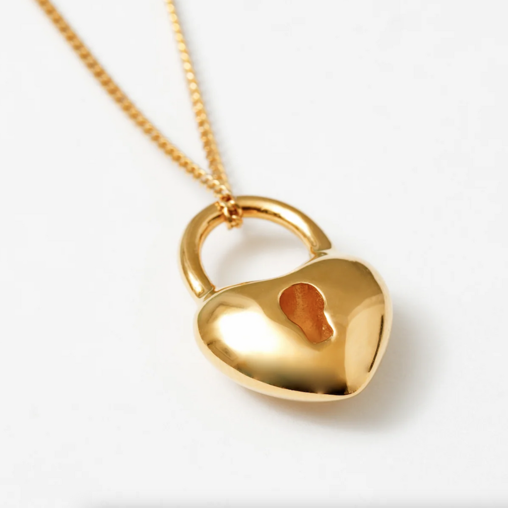 Up Close of Wolf Circus Gold Heart Locket Necklace