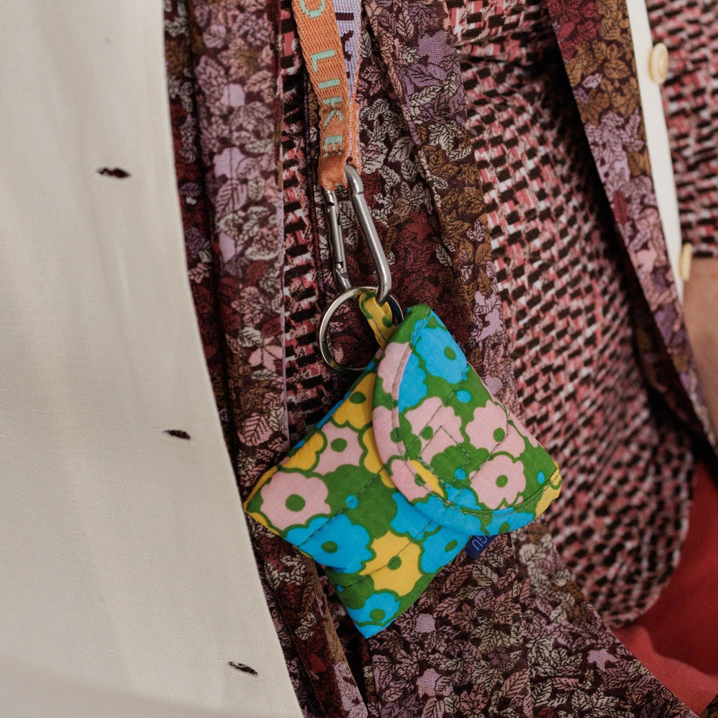 Flowerbed Pink and Green Floral Puffy Earbuds Case by Baggu at Golden Rule Gallery in Excelsior, MN