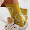 Smiley Face Orche Baggu Crew Socks with Sneakers 