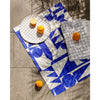 Linen Set of Two Tea Towels by Poketo Styled outside with some oranges