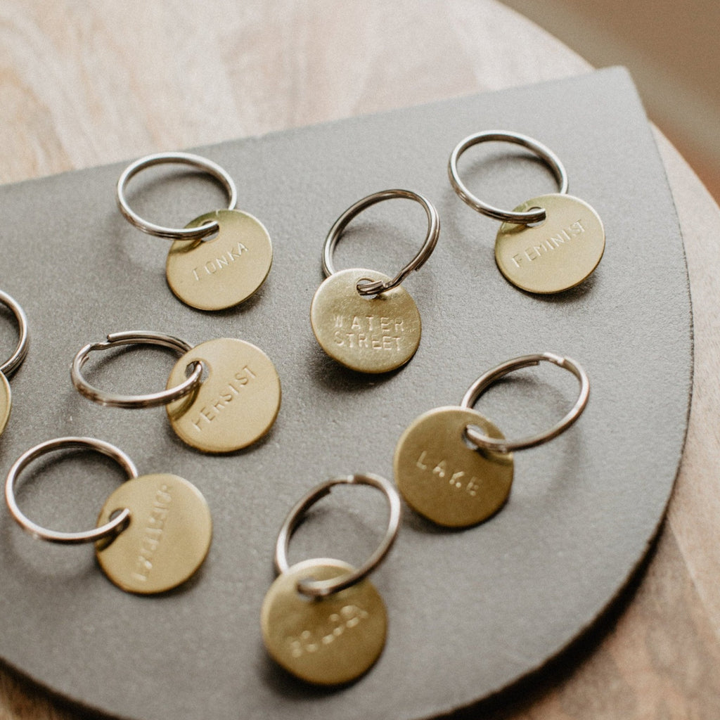 Handmade Minnesota Made Stamped Brass Key Chains at Golden Rule Gallery 