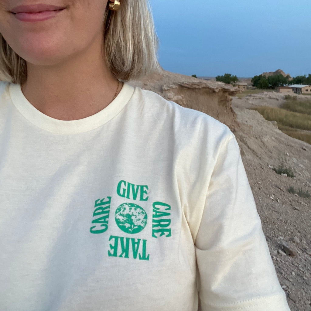 Give Care Take Care Earth T Shirt at Golden Rule Gallery in Excelsior MN