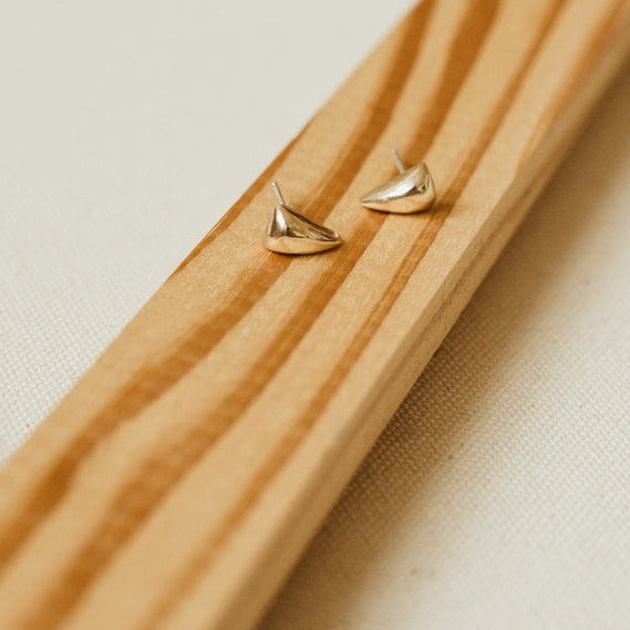 Rounded Triangle Studs | Cast in Brass | Sterling Silver Posts | Kiki Koyote | Golden Rule Gallery | Excelsior, MN |