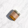 Sweet Grapefruit Soy Candle by P.F. Candle Co. on Marble Background in Excelsior, MN.