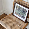 Framed Van Gogh Irises Art Print on Vintage Cane Chair