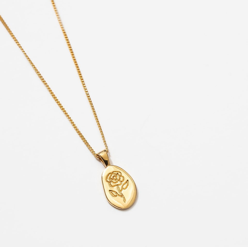 Wolf Circus Engraved Rose Necklace in Gold at Golden Rule Gallery in Excelsior, MN