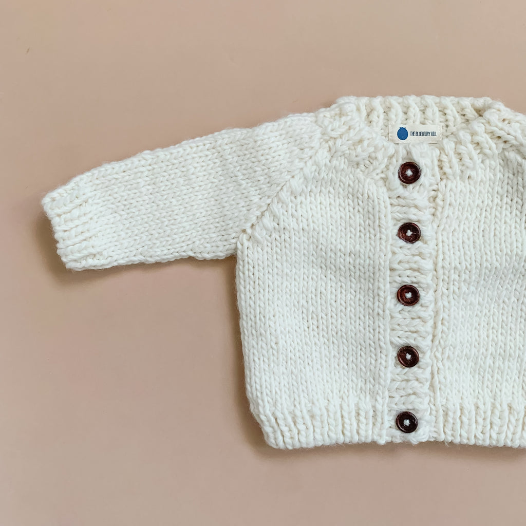 Baby Cream Thick Cardigan Sweater Unisex at Golden Rule Gallery