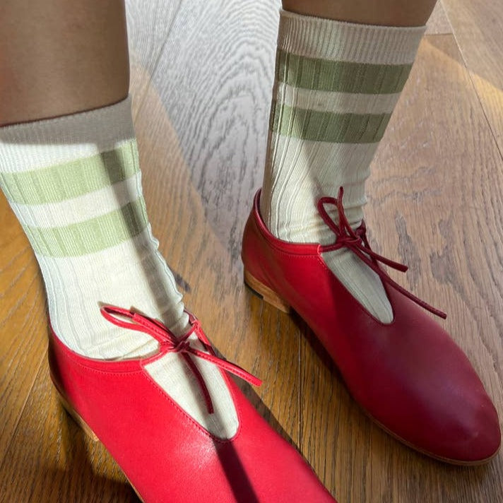 Cream Socks with Green Stripes Worn with Red Heels 