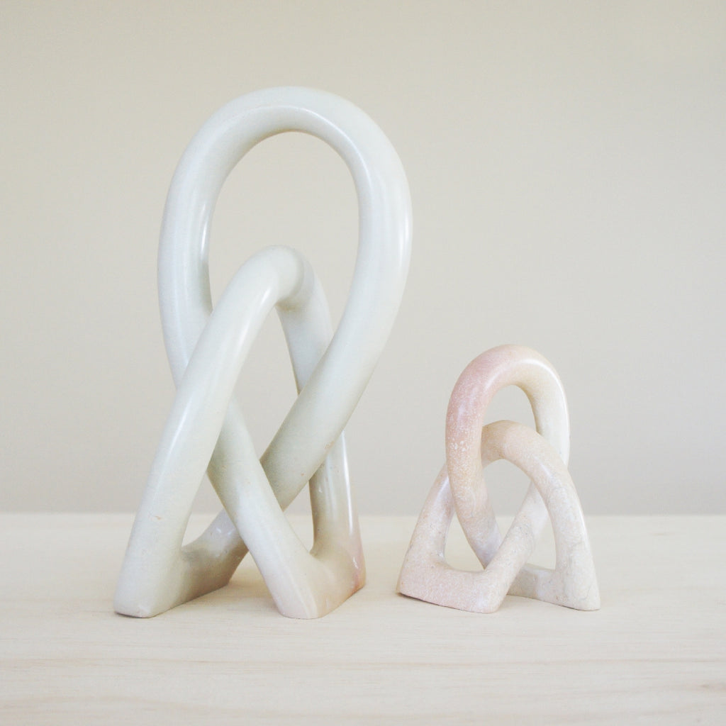 White Natural Stone Knot Sculpture | Venture Imports | Coffee Table Statement Piece | Golden Rule Gallery | Excelsior, MN