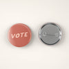 Rose Pink Vote Pin Back Button by August Ink at Golden Rule Gallery in Excelsior, MN
