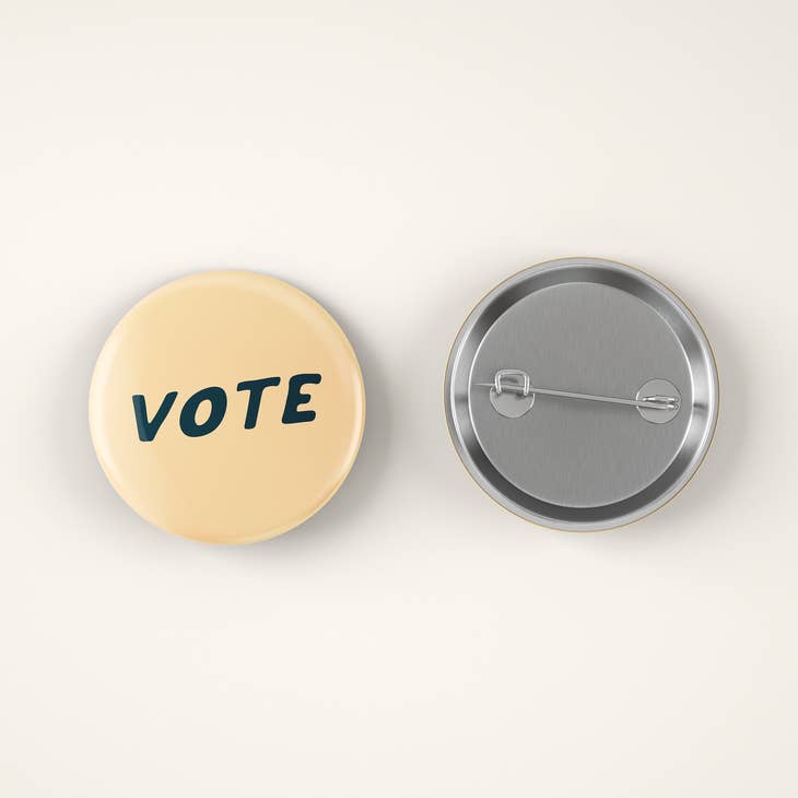 Orange Vote Pin Back Button by August Ink at Golden Rule Gallery in Excelsior, MN