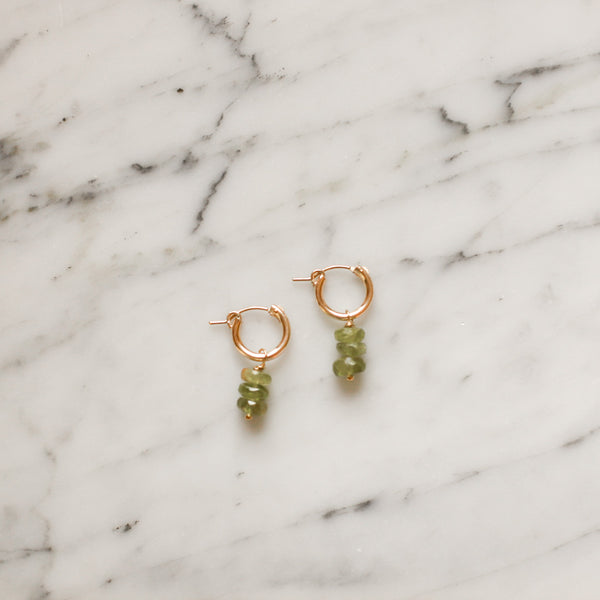 Faceted Peridot and Gold Fill Latch Hoops by Protextor Parrish at Golden Rule Gallery in Excelsior, MN