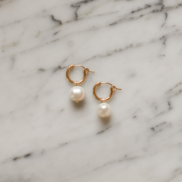 Classic Round Freshwater Pearl and Gold Latch Hoop Earrings by Protextor Parrish at Golden Rule Gallery in Excelsior, MN