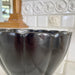 Vintage 50s Red Wing Pottery Black Scalloped Vase styled in a White Bathroom from J'adore Beddor Vintage at Golden Rule Gallery in Excelsior, MN