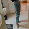 Model Wearing Dark Wash Denim Just Female Bold Boyfriend Jeans in Light Blue at Golden Rule Gallery in Excelsior, MN