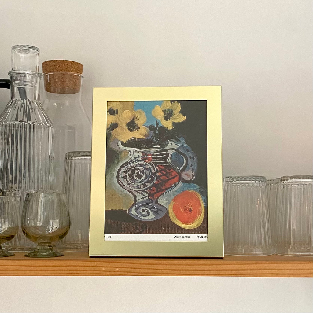 Vintage Brass Framed Picasso Art Styled on Shelf