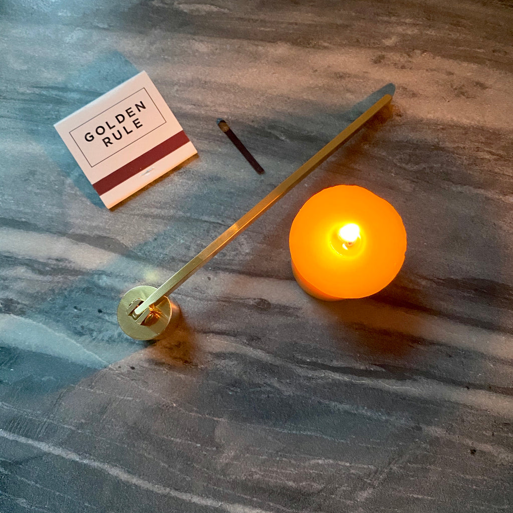 Gold Toned Candle Snuffer at Golden Rule Gallery