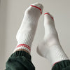 White Tall Tube Socks with Red Stripes at Golden Rule Gallery in MPLS